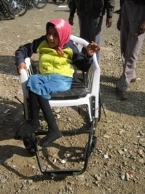 Disabled girl on a wheelchair