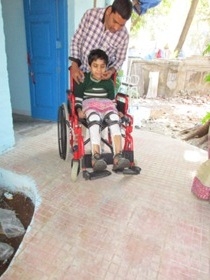 Disabled boy on a wheelchair