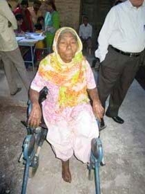 Aged woman Disable on a wheel chair