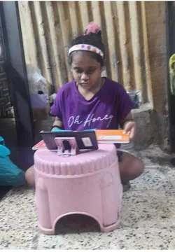 Yashvi studying from her tablet