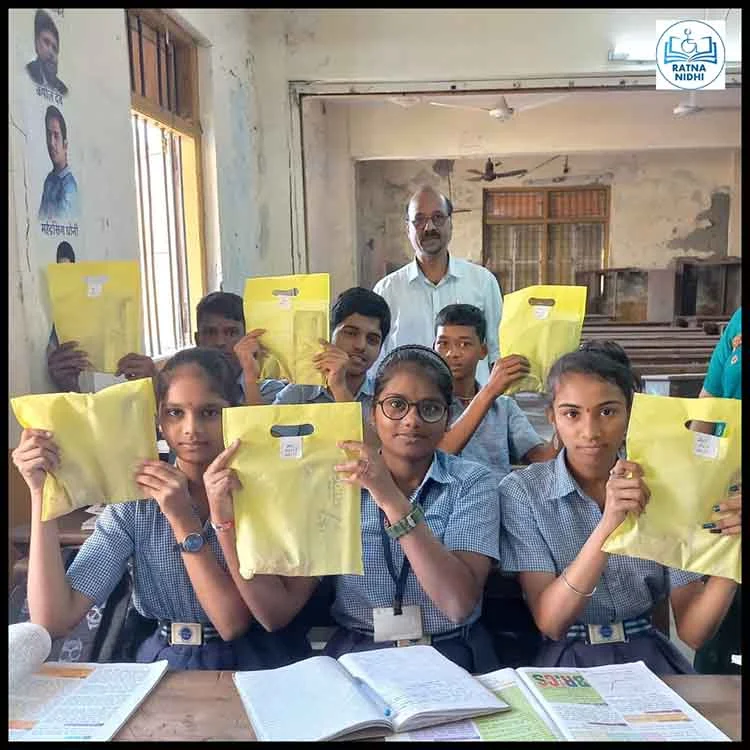  Distribution of Stationery Kits in GA Ranade School